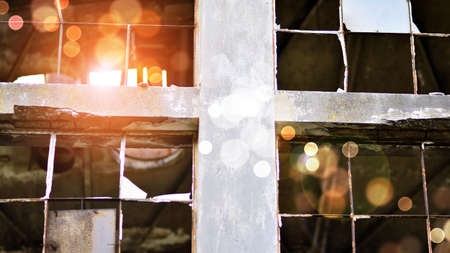 Abandoned and destroyed industrial plant factory. Red sun on horizon, bokeh solar flare.の写真素材