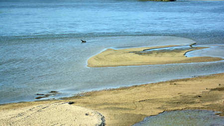 Sunny day on a calm riverの写真素材