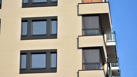 Modern apartment building in sunny day. Exterior, residential house facade.