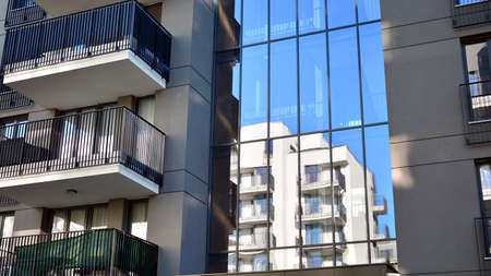 Residential apartment modern housing. Glass city architecture. Luxury business building. Family home.の写真素材