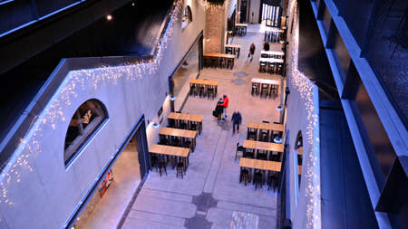 Warsaw, Poland. 8 December 2021. Food Town at the Norblin Factory. It includes five historic factory...