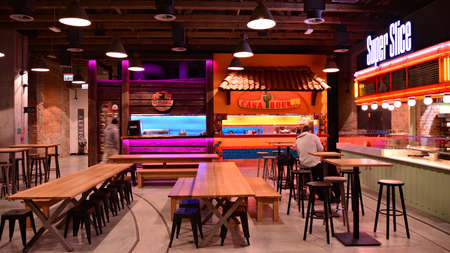 Warsaw, Poland. 8 December 2021. Food Town at the Norblin Factory. It includes five historic factory...