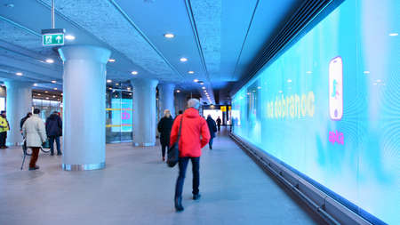 Warsaw, Poland. 11 January 2022. People go through an underpass. Metro station Swietokrzyska .. Blurred motion.のeditorial素材