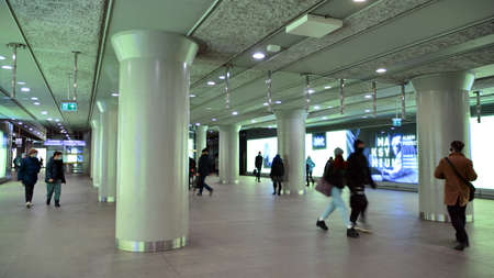 Warsaw, Poland. 11 January 2022. People go through an underpass. Metro station Swietokrzyska .. Blurred motion.のeditorial素材