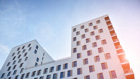 Modern luxury residential flat. Modern apartment building on a sunny day. White apartment building...