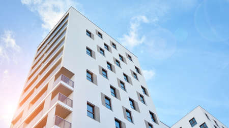 Modern luxury residential flat. Modern apartment building on a sunny day. White apartment building...