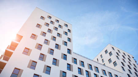 Modern luxury residential flat. Modern apartment building on a sunny day. White apartment building...