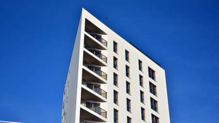 Modern luxury residential flat. Modern apartment building on a sunny day. White apartment building...
