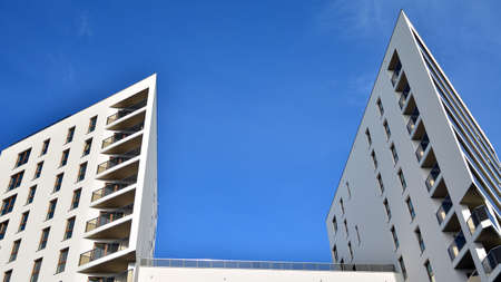 Modern luxury residential flat. Modern apartment building on a sunny day. White apartment building...