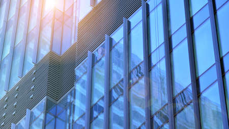 Fragments of building in business district of modern city. High-rise office building in downtown....