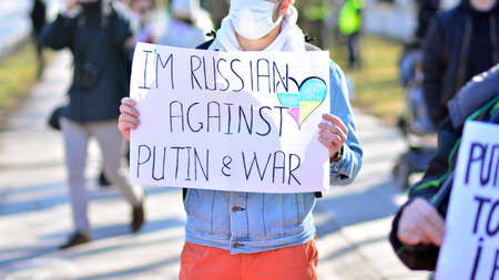 Warsaw, Poland. February 24, 2022. Anti-war protest outside Russian embassy in Warsaw. Demonstrators call for peace and condemn Putin.のeditorial素材
