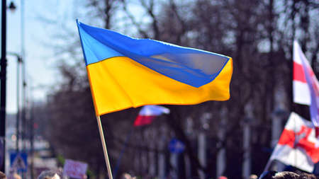 Warsaw, Poland. February 24, 2022. Anti-war protest outside Russian embassy in Warsaw. Demonstrators call for peace and condemn Putin.のeditorial素材