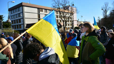 Warsaw, Poland. February 24, 2022. Anti-war protest outside Russian embassy in Warsaw. Demonstrators...
