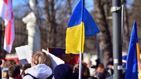 Warsaw, Poland. February 24, 2022. Anti-war protest outside Russian embassy in Warsaw. Demonstrators call for peace and condemn Putin.のeditorial素材