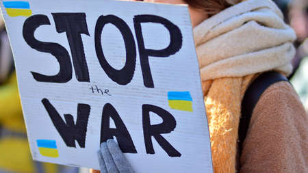 Warsaw, Poland. February 24, 2022. Anti-war protest outside Russian embassy in Warsaw. Demonstrators call for peace and condemn Putin.のeditorial素材