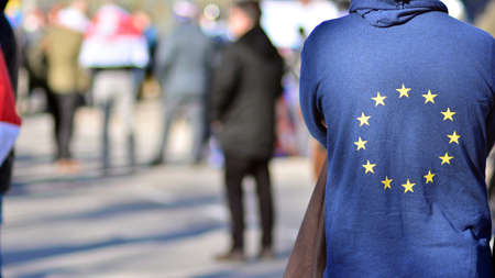 Warsaw, Poland. February 24, 2022. Anti-war protest outside Russian embassy in Warsaw. Demonstrators call for peace and condemn Putin.のeditorial素材