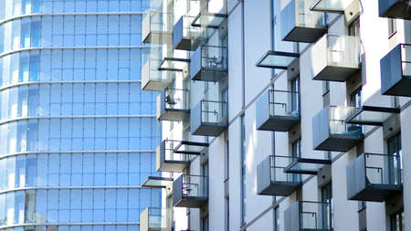 Fragment of modern residential apartment with flat buildings exterior. Detail of new luxury house...