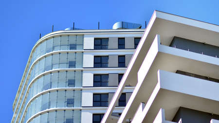 Fragment of modern residential apartment with flat buildings exterior. Detail of new luxury house...
