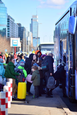 Warsaw, Poland. 28 February 2022. The humanitarian crisis in Europe caused by Russia's attack on Ukraine. Ukrainian refugees at the railway station.のeditorial素材