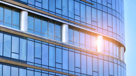Perspective view to steel and blue glass. Commercial modern city of future. Business concept of...