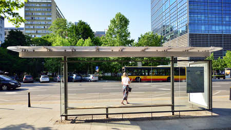 Warsaw, Poland. 18 June 2022. Walking through the city. Pedestrians walking on sidewalks.のeditorial素材