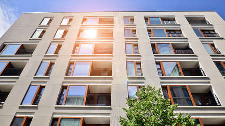 Modern luxury residential flat. Modern apartment building on a sunny day. Apartment building with a...