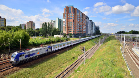 Warsaw, Poland. 14 July 2022. A view of the office buildings and railroad tracks from the footbridge...