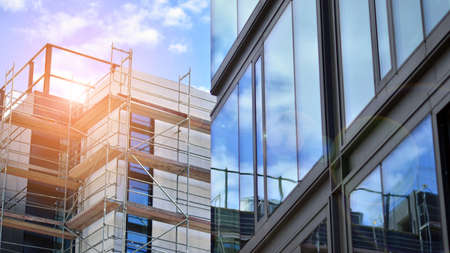 Building under construction. Construction site with new modern apartment buildings