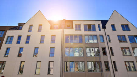Modern residential building on a sunny day. Apartment house.