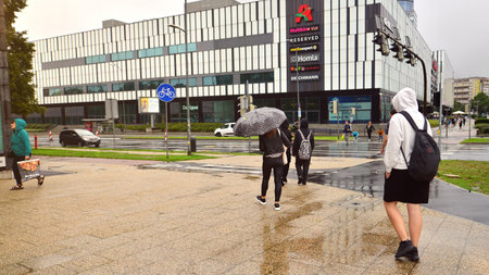 Szczecin, Poland. 29 August 2022. People with umbrellas on a rainy day outsideのeditorial素材