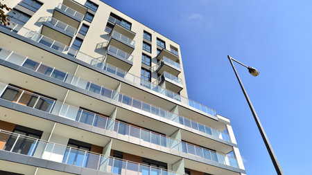 Modern luxury residential flat. Modern apartment building on a sunny day. Apartment building with a...