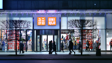 Warsaw, Poland. 23 November 2022. Evening city life in the center of Warsaw. People walking Warsaw...