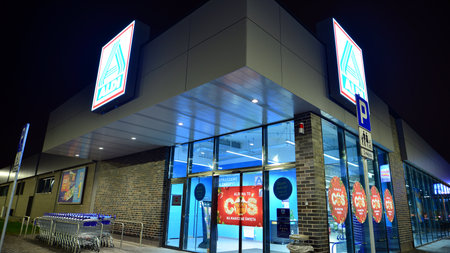 Warsaw, Poland. 29 November 2022. Night view of a supermarket of the German food chain Aldi.のeditorial素材