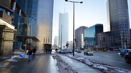 Warsaw, Poland. 14 December 2022. Winter street of a big city. Downtown street traffic in Warsaw.のeditorial素材