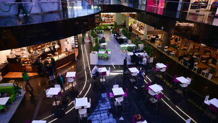 Warsaw, Poland. 19 January 2023. The modern interiors of Plac Unii shopping mall. In a very pleasant atmosphere, customers of the center can enjoy a wide shopping offer.のeditorial素材