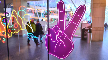 Warsaw, Poland. February 10, 2023. The interior of the Golden Terraces shopping center. Decorative neon lightsのeditorial素材