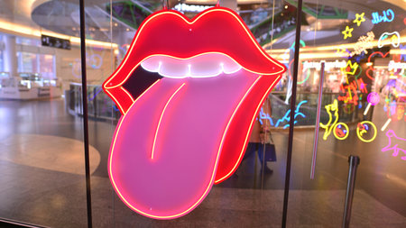 Warsaw, Poland. February 10, 2023. The interior of the Golden Terraces shopping center. Decorative neon lightsのeditorial素材