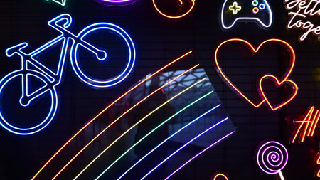 Glowing fragment of a neon sign, close-up, abstract background