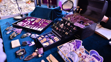 Warsaw, Poland. 5 March 2023. Warsaw Mineral Expo 2023. Colored stones of different sizes lying on a shelf. Exhibition of semi-precious stones.のeditorial素材