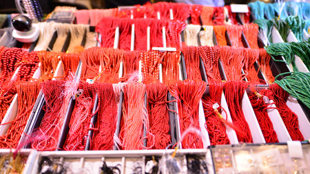 Warsaw, Poland. 5 March 2023. Warsaw Mineral Expo 2023. Colored stones of different sizes lying on a shelf. Exhibition of semi-precious stones.のeditorial素材