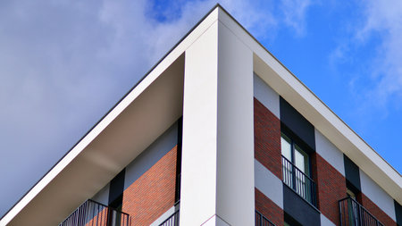 Modern architecture building facade with balconies. New apartments. Contemporary apartment building.