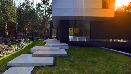 Fragment of a single-family house facade. Upscale house in a wooded areaの写真素材