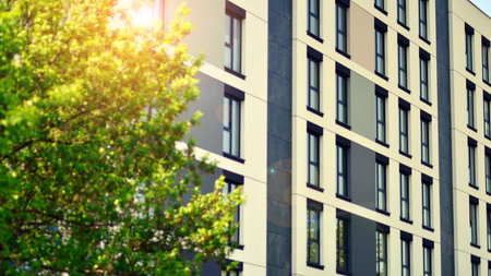 eco architecture. Green tree and new apartment building. The harmony of nature and modernity. Modern...
