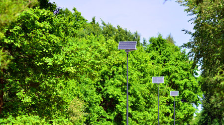 Street light powered by solar panel with battery included. Alternative energy from the sun.の写真素材