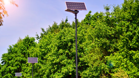 Street light powered by solar panel with battery included. Alternative energy from the sun.