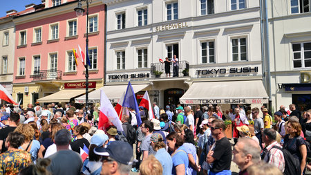 Warsaw, Poland. 4 June 2023. Hundreds of thousands march in anti-government protest to show support for democracy. The spontaneous reaction of people during the great March of theのeditorial素材