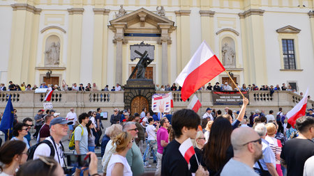 Warsaw, Poland. 4 June 2023. Hundreds of thousands march in anti-government protest to show support for democracy. The spontaneous reaction of people during the great March of theのeditorial素材