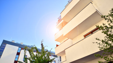 Low energy houses with apartments. Residential area with ecological and sustainable green...