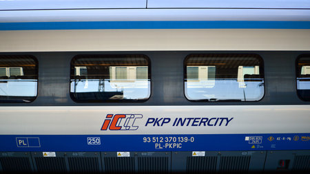 Warsaw, Poland. 5 September 2023. PKP Intercity Polish train sleeping car at station platform awaiting departure in late afternoon. PKP intercity Pendolino train.のeditorial素材