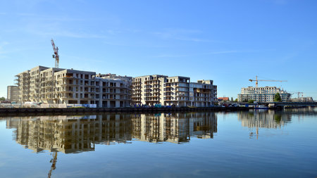 Szczecin, Poland. 7 September 2023. Construction of residential buildings on the island of Kepa Parnicka.のeditorial素材